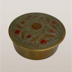 Vintage small round brass covered box with enameled top